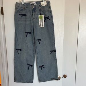 Women's Blue Jeans with Bow Accents. New. Size 11/30